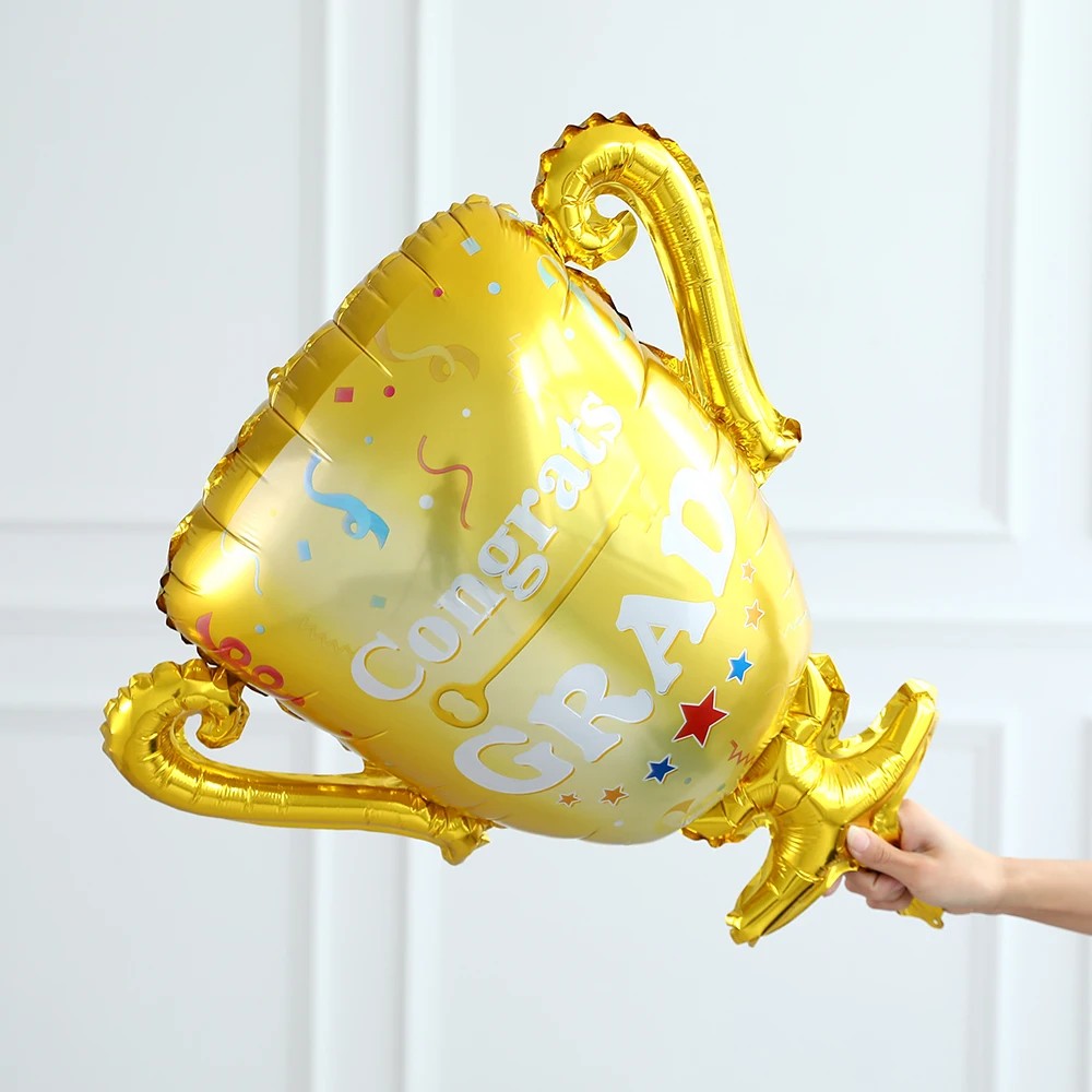 Balon din Folie Metalizata, Figurina Cupa, Tema Absolvire, 65x72cm, Ambalaj Individual, Pai Inclus, Umflare cu Aer sau Heliu, Galben