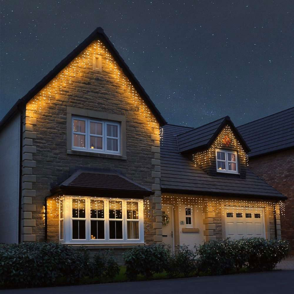 Instalatie Craciun Turturi, IP44, 5 m, 143 Led-uri ,Perdea Franjurata, Alb cald, 8 jocuri de lumini, Transformator 31 V, Putere 9 W, Interconectabila, Interior/Exterior, Prelungitor 3 m inclus, Fir Transparent