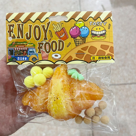 Jucarie Antistres Squishy, cu Revenire Lenta, Model Croissant, 10x8 cm, 90g, Ambalaj Transparent, Maro
