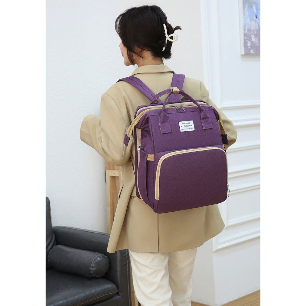 Rucsac Multifunctional pentru Mamici, cu Patut Pliabil si Baza de Schimbat, Rezistent la Apa, Capacitate Mare, Usor, Compartimente Multiple, Buzunar Termic pentru Lapte, 42 x 32 x 22 cm, Mov