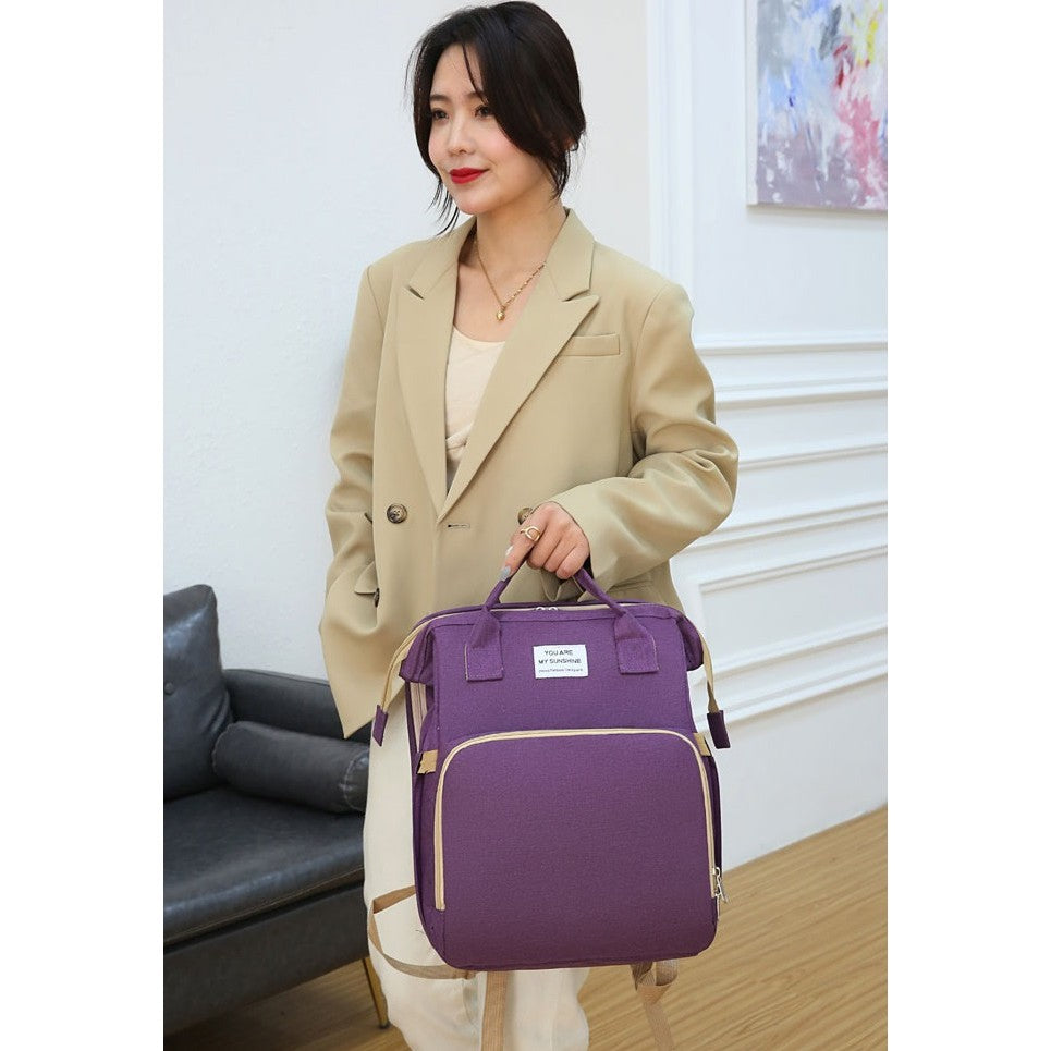 Rucsac Multifunctional pentru Mamici, cu Patut Pliabil si Baza de Schimbat, Rezistent la Apa, Capacitate Mare, Usor, Compartimente Multiple, Buzunar Termic pentru Lapte, 42 x 32 x 22 cm, Mov