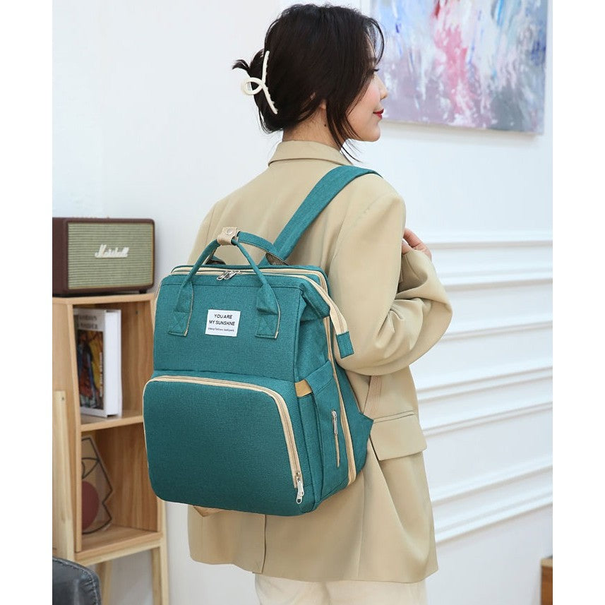 Rucsac Multifunctional pentru Mamici, cu Patut Pliabil si Baza de Schimbat, Rezistent la Apa, Capacitate Mare, Usor, Compartimente Multiple, Buzunar Termic pentru Lapte, 42 x 32 x 22 cm, Verde