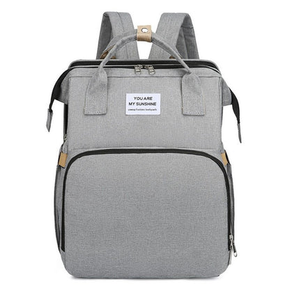 Rucsac Multifunctional pentru Mamici, cu Patut Pliabil si Baza de Schimbat, Rezistent la Apa, Capacitate Mare, Usor, Compartimente Multiple, Buzunar Termic pentru Lapte, 42 x 32 x 22 cm, Gri