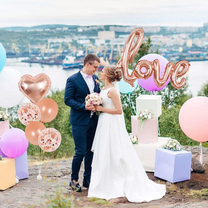Balon din Folie Metalizata, Model Love scris de mana, 102x65 cm, Tematica Ziua Îndrăgostiților, Ambalaj Individual, Pai Inclus, Umflare cu Aer sau Heliu, Rose Gold